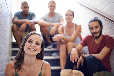 Buy stock photo Woman, stairs and students in portrait, university and relaxing with education and friends. Men, women and people with diversity and scholarship for college and together, learning and course on steps