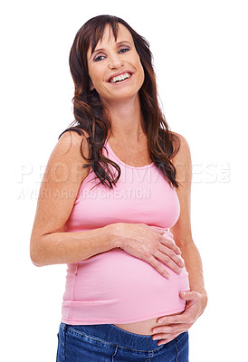 Buy stock photo Portrait, woman and pregnant in studio smile, laugh and touching belly with happiness. Female person, maternity and relax on white background with casual or clothes, trendy and stylish for fashion