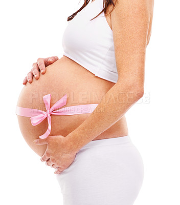 Buy stock photo Cropped shot of a pregnant woman isolated on white