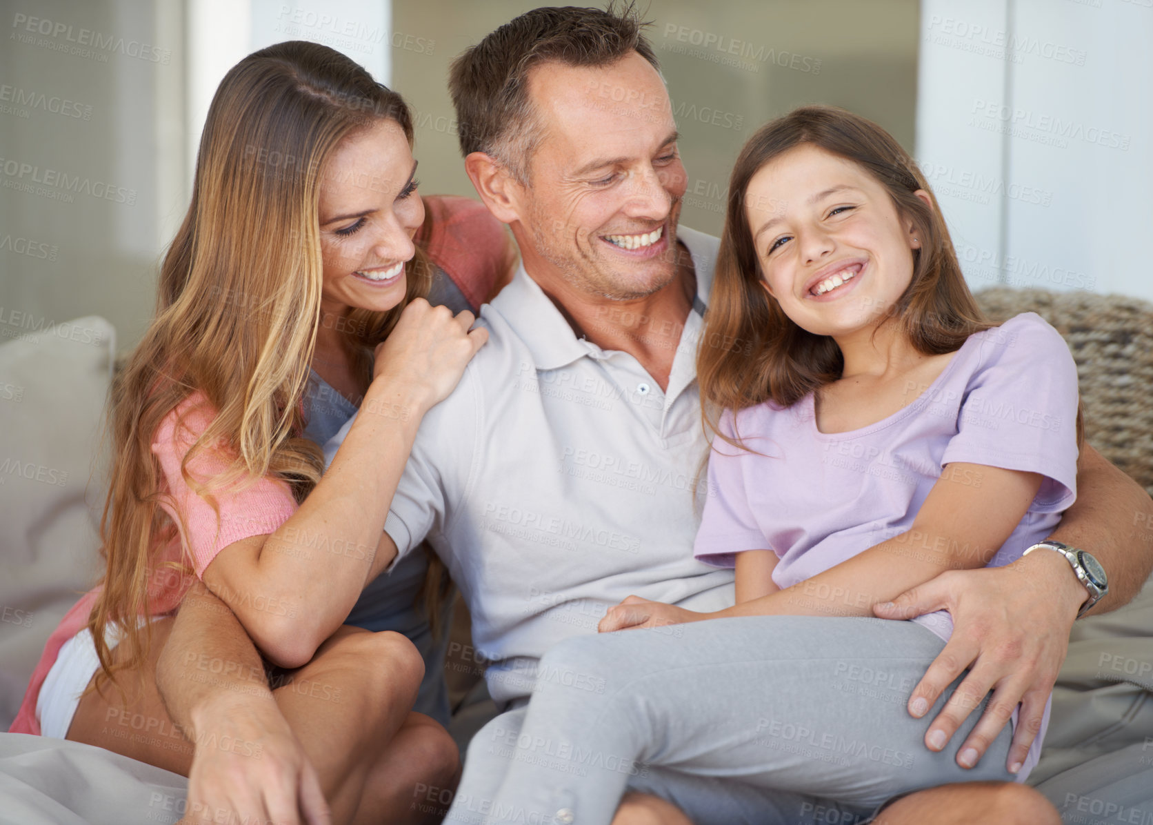 Buy stock photo Parents, girl kid and portrait on patio with hug, care and love with dad with smile at family house. Father, mother and daughter with embrace, connection and happy to relax together in backyard