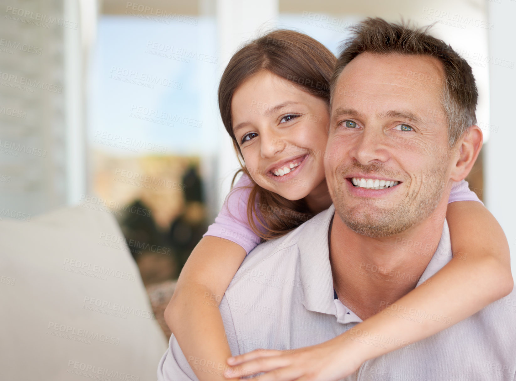 Buy stock photo Home, man and father with daughter with smile, hug and happiness in living room on sofa. Family, dad and child together in lounge on couch, embrace and parent with kid to relax in house for weekend