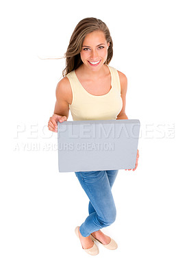 Buy stock photo High angle shot of a beautiful young woman holding a blank placard against a white background