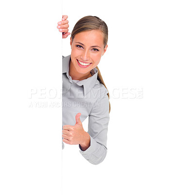 Buy stock photo Studio shot of an attractive young businesswoman standing with copyspace and showing a thumbs up