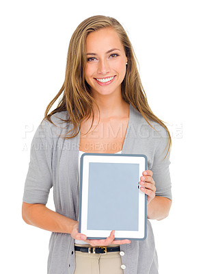 Buy stock photo Studio portrait of an attractive young woman holding a digital tablet