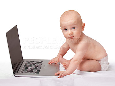 Buy stock photo Baby, laptop and studio for portrait, fun and games in child development and curious technology. Infant, happy and newborn for home, diaper and white background for playful and sitting by tech