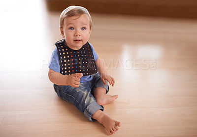 Buy stock photo Boy, baby and relax in home on floor, growth and curious or relax in living room and care. Child development, happy kid and calm or comfortable, mockup space and toddler for health and wellness