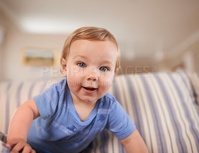 Buy stock photo Playing, crawl and portrait of baby in sofa or home for fun, growth or learning alone in living room. Energy, boy or face of a curious male kid on couch for child development or wellness in a house