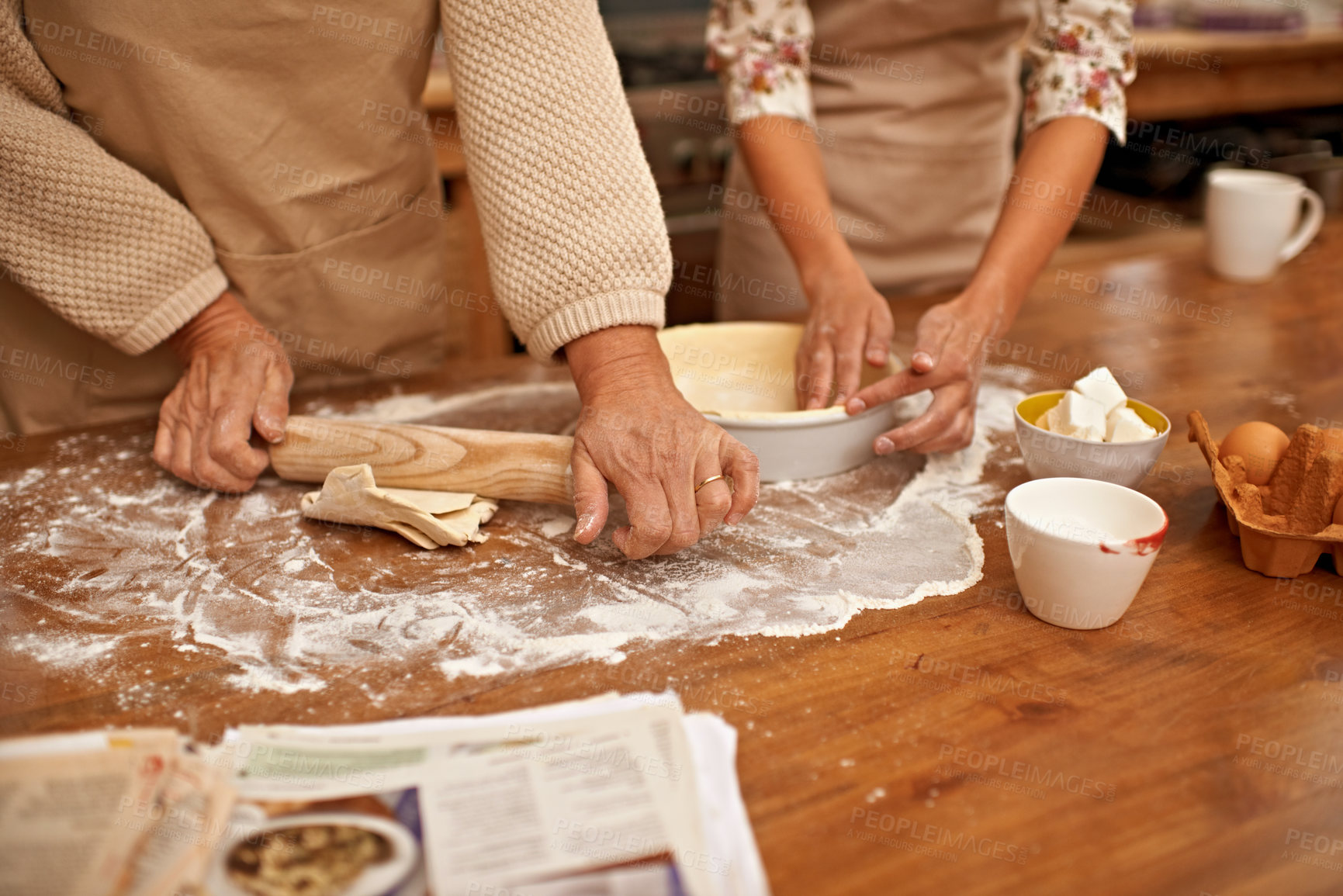 Buy stock photo Hands, dough and people baking in kitchen of home together closeup with ingredients for recipe. Cooking, food or flour with baker and chef in apartment for fresh pastry preparation from above