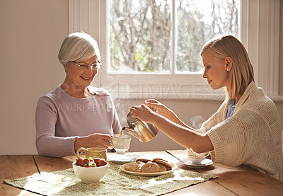 Buy stock photo Happy, grandmother and woman with tea in home for brunch, bonding or visit in retirement. Senior, grandma and girl on coffee break with food, conversation and pouring liquid with steam in morning
