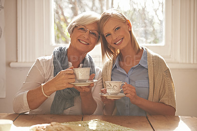 Buy stock photo Portrait, happy woman and elderly mother drinking coffee at breakfast in the morning, bonding and smile in house. Face, senior mom and daughter with tea cup at table, love and family at home together