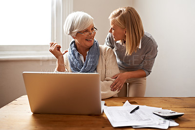 Buy stock photo Cropped view of a senior woman receiving help with her finances from her granddaughter
