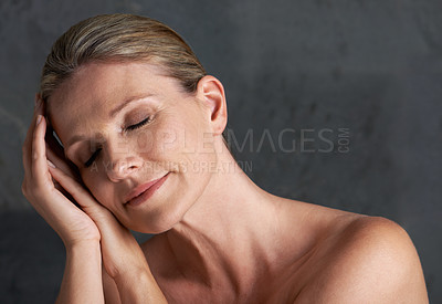 Buy stock photo Mature woman, studio and nude for beauty, skin care and natural look in self love moment of thought. Old caucasian female person, face and dreaming in grey background, body and naked confidence