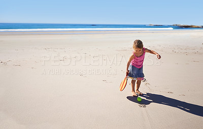 Buy stock photo Happy girl, beach and paddle bat with ball for playful summer, holiday weekend or outdoor game in nature. Female person, child or kid enjoying fun day or activity by the ocean coast on mockup space