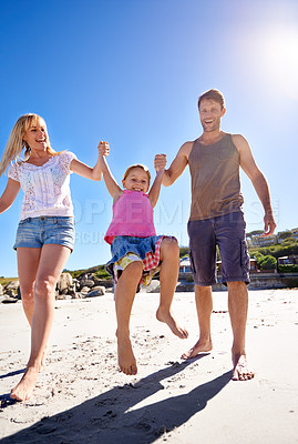 Buy stock photo Parents, swing and holding hands with girl at beach in portrait with care, love or bonding in summer on holiday. Father, mother and daughter with games, connection or playing in sunshine on vacation