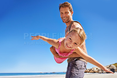 Buy stock photo Happy father, portrait and beach with child flying for fun summer, holiday or outdoor weekend together in nature. Dad, little girl or playing with daughter in freedom by the ocean coast with blue sky