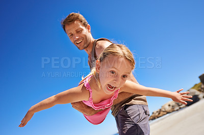 Buy stock photo Happy dad, beach and flying with child for fun summer, holiday or outdoor weekend together in nature. Father, little girl or playing with daughter for freedom in sun by the ocean coast with blue sky