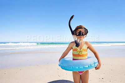 Buy stock photo Beach, fun and girl child with swimming inflatable, snorkel and excited against ocean background. Adventure, portrait and kid at the sea with a swim ring for exploring, playing and vacation in Bali