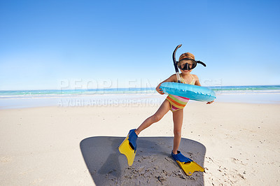 Buy stock photo Beach, girl child and swimming inflatable, snorkel and excited for fun against ocean background. Adventure, portrait and kid at the sea with a swim ring for exploring, playing and vacation in Bali