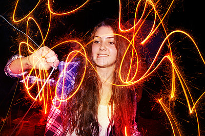 Buy stock photo Fireworks, night and celebration with teenage girl, excited and shouting with happiness and culture. Person, outdoor and sparkler with New Years party and event with tradition and evening with joy