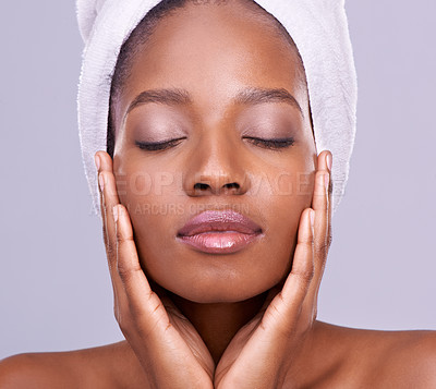 Buy stock photo Skincare, towel and face of black woman in studio for cleaning, shower and wellness for beauty. Salon aesthetic, dermatology and isolated person for natural skin, washing and facial on background