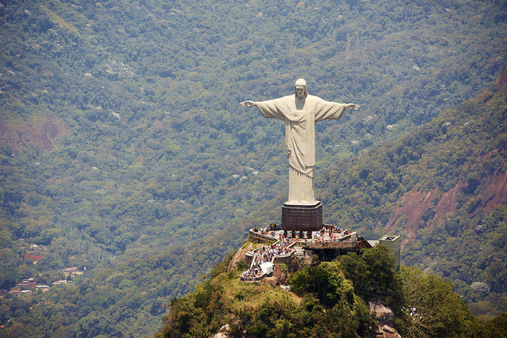 Buy stock photo Landscape, monument and Christ the Redeemer statue for tourism, sightseeing and travel destination. Traveling, Rio de Janeiro and aerial view of architecture, sculpture or landmark on Brazil mountain