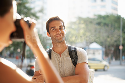 Buy stock photo Tourist, man and photography in street for travel, sightseeing and happiness on holiday or vacation in Brazil. Arms crossed, person or smile in city road for explore, tourism or journey in urban town