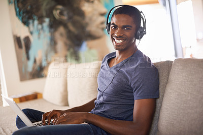 Buy stock photo Man, portrait or radio with laptop on sofa for internet streaming, happiness or online research with music. Student, black person or technology with headphones for relax, studying or learning in home