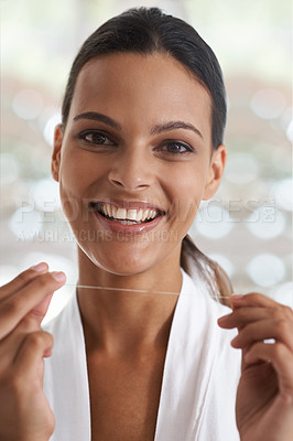 Buy stock photo Woman, teeth and smile with floss, self care and portrait for health in bathroom. Person, cleaning and healthcare for dental, oral hygiene and routine at home or house with dentistry and whitening