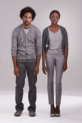 Buy stock photo Exhausted, bored and portrait of couple in studio with bad posture for long week, depression or tired. Man, woman and face of people with dull clothes for grief, problems or lazy on gray background