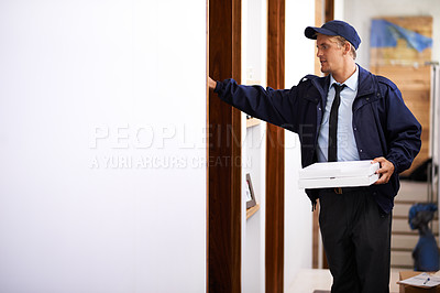 Buy stock photo Pizza, delivery and man at front door to home of customer, giving a box and easy service. Ecommerce, courier and person with takeaway, order and fast supply chain or transport of package to house