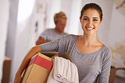 Buy stock photo Home, woman and happy with box for moving in with clothes, satisfied and property ownership. Portrait, people and packing furniture in new house with investment, real estate for growth and future. 