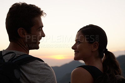 Buy stock photo Hiking, love and happy couple on vacation at sunset with smile for holiday, support or sightseeing. Back, tourism and romantic man with a woman on outdoor adventure travel in Rio de Janeiro, Brazil