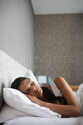 Buy stock photo Woman, sleeping and bed for rest, dream and wellness as stress relief in bedroom in Rio de Janeiro. Mental health, female person and eyes closed on pillow for calm, peace and relax for self care