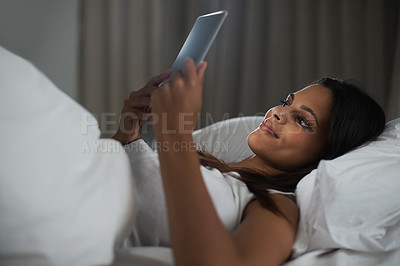Buy stock photo Bed, sleeping and woman on social media with tablet, online and connection to internet for app. Bedroom, smile and communication with digital and female person on dating site with technology
