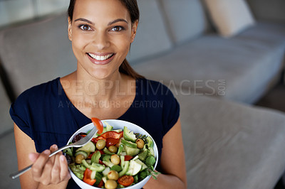 Buy stock photo Black woman, portrait and salad for food, eating and diet on sofa, couch and lounge. Vegan lady, happy female person and vegetables for health, nutrition and wellness at home, house and living room
