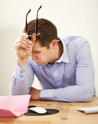 Buy stock photo Stress, job loss and businessman at desk with fear of bankruptcy, debt and letter of unemployment. Anxiety, depression and burnout, business risk and frustrated man in office with termination notice