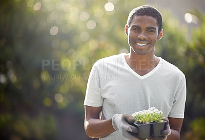 Buy stock photo Black man, sustainability and plant growth in nature for nature, environment development and mockup space. Gardener, growing and sustainable eco friendly work of a person with care for gardening