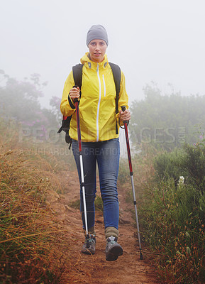 Buy stock photo Woman, hiking and trail in nature with fitness outdoor gear for travel, adventure and backpacking. Freedom, path and female person in trekking pole for wellness, exercise or balance in forest.