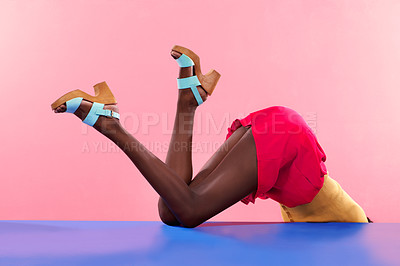 Buy stock photo Cropped shot of footwear on a colourful background