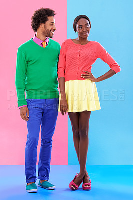 Buy stock photo Fashion, happy and young black couple in studio with colorful, trendy and stylish outfit. Smile, love and full body of confident African man and woman with edgy, classy and retro style by background.