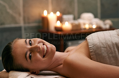Buy stock photo Happy, woman and portrait in spa with candles at night for luxury treatment in hotel on vacation. Girl, relax and smile for cosmetics, skincare and holiday at resort to care for beauty and wellness