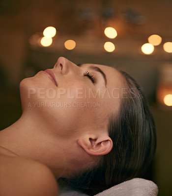 Buy stock photo Woman, spa and candle with luxury, relax and peace with wellness and bokeh. Person, skincare and health for zen, calm and body care at resort or massage parlour and serene ambience and treatment