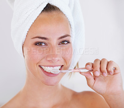 Buy stock photo Close up of a pretty lady brushing her teeth