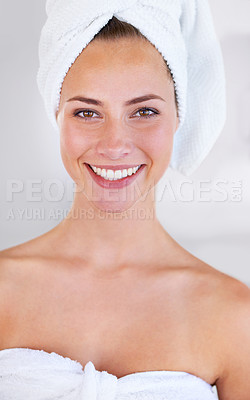 Buy stock photo Portrait, beauty and skincare of happy woman in towel for wellness in bathroom at home. Face, natural and cosmetics of female person with spa facial treatment, dermatology or glow for healthy skin