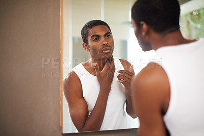 Buy stock photo Bathroom, face and black man grooming for skincare or self care with treatment for guy. African male person, morning and healthcare with dermatology for results of soft, shine and glow in mirror