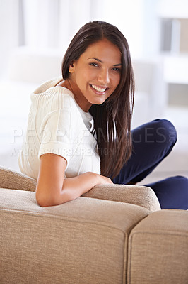 Buy stock photo Portrait, smile and wellness with woman on sofa in living room of home for free time, leisure or weekend. Relax, break and chilling with happy young person alone on comfortable couch in apartment