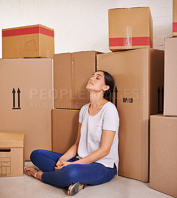 Buy stock photo Woman, moving and boxes in living room for real estate, property investment and mortgage of new apartment. Homeowner, tired and female person with cardboard for home loan, relocation or renovation.
