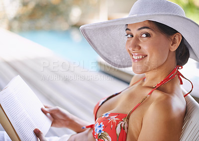 Buy stock photo Shot of a young woman relaxing outdoors while on vacation