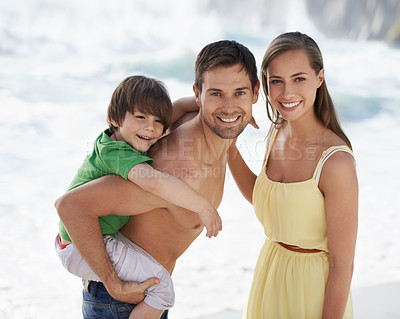 Buy stock photo Family, child and happy portrait at beach on travel holiday in summer with a smile and piggy back fun. A man, woman and kid or son playing together on vacation at sea with love, care and happiness