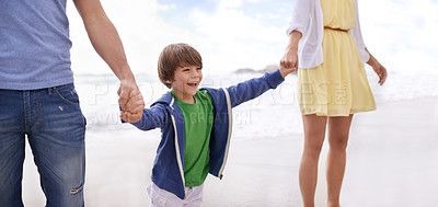 Buy stock photo Happy, kid and holding hands with parents on the beach for walk in summer, holiday or vacation with happiness. Excited, child and family together in banner at ocean or sea for adventure in Florida